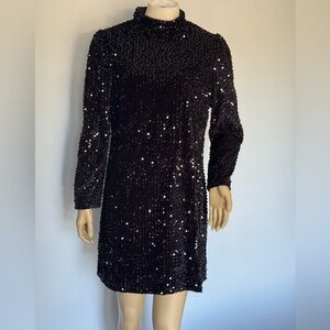 Glamorous Black Sequin Long Sleeve Dress. Ptp 19”, lenght 33”